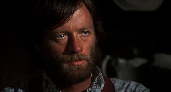Movie still from “The Hired Hand” (1971), directed by Peter Fonda – A person with a beard; Close Up shot, Low angle