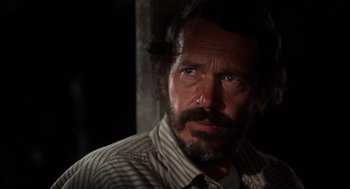 Movie still from “The Hired Hand” (1971), directed by Peter Fonda – A person with a beard; Close Up shot, Low angle