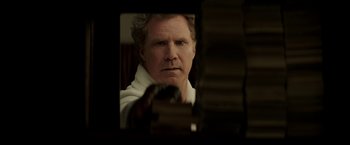 Movie still from “The House” (2017), directed by Andrew Jay Cohen – A person in a mirror; Close Up shot, Over the shoulder angle