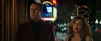 Movie still from “The House” (2017), directed by Andrew Jay Cohen – A man and a woman standing on the street at night; Medium shot, Low angle