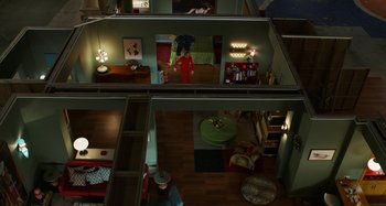 Movie still from “The Human Voice” (2020), directed by Pedro Almodóvar – An overhead view of a living room and a bedroom; Extreme Wide shot, Overhead angle