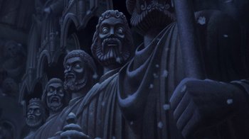 Movie still from “The Hunchback of Notre Dame” (1996), directed by Gary Trousdale – View of a statue of a group of people; Medium shot, Low angle