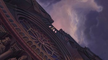 Movie still from “The Hunchback of Notre Dame” (1996), directed by Gary Trousdale – A painting of an old building with a sky background; Extreme Wide shot, Low angle