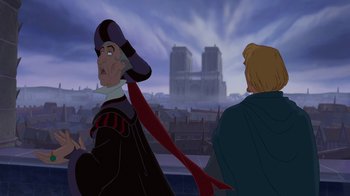 Movie still from “The Hunchback of Notre Dame” (1996), directed by Gary Trousdale – A man wearing a hat and a long red scarf; Medium shot, Over the shoulder angle