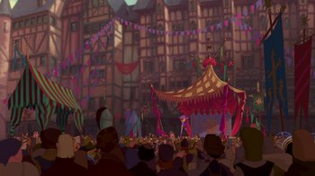 Movie still from “The Hunchback of Notre Dame” (1996), directed by Gary Trousdale – A crowd of people gathered around a tent; Extreme Wide shot, Low angle