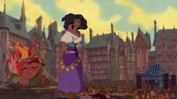 Movie still from “The Hunchback of Notre Dame” (1996), directed by Gary Trousdale – A woman standing in front of a crowd of people; Extreme Wide shot, Low angle