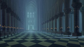 Movie still from “The Hunchback of Notre Dame” (1996), directed by Gary Trousdale – An empty cathedral with candles in the middle of the floor; Extreme Wide shot, High angle