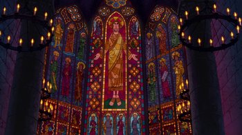 Movie still from “The Hunchback of Notre Dame” (1996), directed by Gary Trousdale – A stained - glass window of jesus is shown in a church; Extreme Wide shot, Low angle