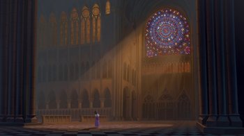 Movie still from “The Hunchback of Notre Dame” (1996), directed by Gary Trousdale – A woman standing in front of a stained - glass window; Extreme Wide shot, High angle