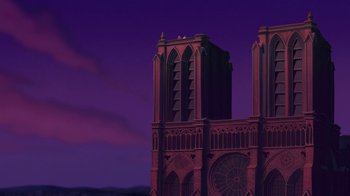 Movie still from “The Hunchback of Notre Dame” (1996), directed by Gary Trousdale – A large building with a sky background at night time; Extreme Wide shot, Low angle