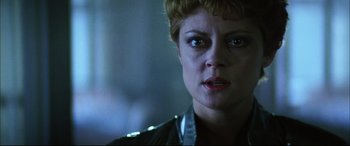 Movie still from “The Hunger” (1983), directed by Tony Scott – A person with short blonde hair; Close Up shot, Low angle