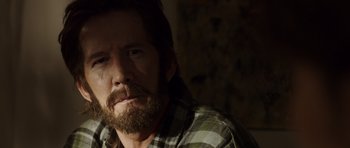 Movie still from “The Hunt” (2012), directed by Thomas Vinterberg – A person with a beard; Close Up shot, Over the shoulder angle