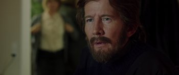 Movie still from “The Hunt” (2012), directed by Thomas Vinterberg – A person with a beard; Close Up shot, Over the shoulder angle