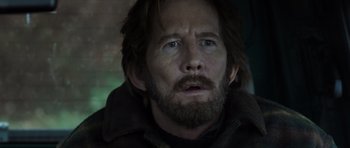 Movie still from “The Hunt” (2012), directed by Thomas Vinterberg – A person with a beard; Close Up shot, Over the shoulder angle