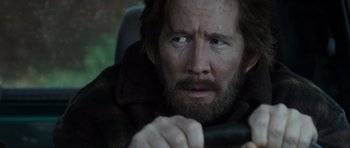 Movie still from “The Hunt” (2012), directed by Thomas Vinterberg – A person with a beard; Close Up shot, Over the shoulder angle