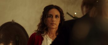 Movie still from “The Hunt” (2012), directed by Thomas Vinterberg – A person with long curly hair; Close Up shot, Over the shoulder angle