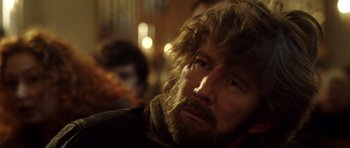 Movie still from “The Hunt” (2012), directed by Thomas Vinterberg – A person with a beard; Close Up shot, Over the shoulder angle