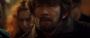 Movie still from “The Hunt” (2012), directed by Thomas Vinterberg – A person with a beard; Close Up shot, Over the shoulder angle