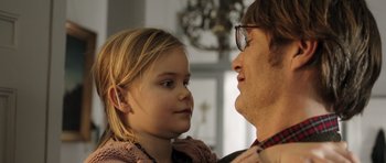 Movie still from “The Hunt” (2012), directed by Thomas Vinterberg – A man and a little girl looking at each other; Close Up shot, Over the shoulder angle