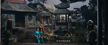 Movie still from “The Inn of the Sixth Happiness” (1958), directed by Mark Robson – A group of women standing next to a pond; Extreme Wide shot, High angle