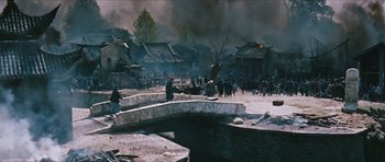 Movie still from “The Inn of the Sixth Happiness” (1958), directed by Mark Robson – A group of people standing next to each other on top of a bridge; Extreme Wide shot, High angle