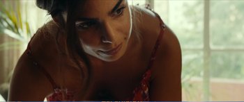 Movie still from “The Insult” (2017), directed by Ziad Doueiri – A woman in a red top; Close Up shot, Low angle