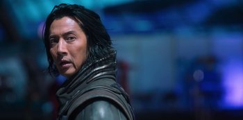 Movie still from “Altered Carbon” (2018), created by Laeta Kalogridis – A person with long black hair; Close Up shot, Over the shoulder angle