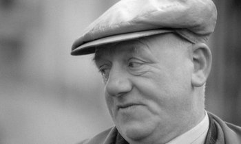 Movie still from “The Knack... and How to Get It” (1965), directed by Richard Lester – An older man wearing a hat and a jacket; Close Up shot, Low angle