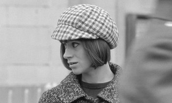Movie still from “The Knack... and How to Get It” (1965), directed by Richard Lester – A woman wearing a hat and a coat; Close Up shot, High angle