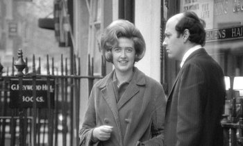 Movie still from “The Knack... and How to Get It” (1965), directed by Richard Lester – An old photo of a man and a woman; Medium shot, Low angle