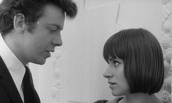 Movie still from “The Knack... and How to Get It” (1965), directed by Richard Lester – A man and a woman looking at each other; Close Up shot, Over the shoulder angle