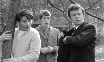 Movie still from “The Knack... and How to Get It” (1965), directed by Richard Lester – A group of young men standing next to each other; Medium shot, Over the shoulder angle