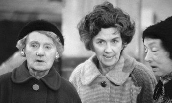 Movie still from “The Knack... and How to Get It” (1965), directed by Richard Lester – Two older women standing next to each other; Close Up shot, High angle