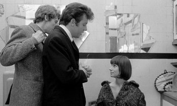 Movie still from “The Knack... and How to Get It” (1965), directed by Richard Lester – A man and a woman talking to each other; Medium shot, Over the shoulder angle