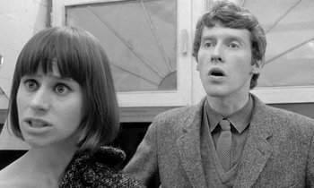 Movie still from “The Knack... and How to Get It” (1965), directed by Richard Lester – A man and a woman looking surprised in a black and white photo; Close Up shot, Low angle