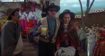 Movie still from “The Last Movie” (1971), directed by Dennis Hopper – A man and a woman dressed in traditional peruvian clothing; Medium shot, Low angle