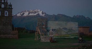 Movie still from “The Last Movie” (1971), directed by Dennis Hopper – A painting of a horse in front of a mountain range; Extreme Wide shot, High angle