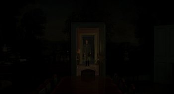 Movie still from “The Little Stranger” (2018), directed by Lenny Abrahamson – A man standing in front of an open door at night; Extreme Wide shot, High angle