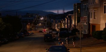 Movie still from “Always Be My Maybe” (2019), directed by Nahnatchka Khan – People walking down a street at night in the dark; Extreme Wide shot, High angle