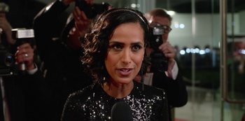 Movie still from “Always Be My Maybe” (2019), directed by Nahnatchka Khan – A woman in a black dress is being interviewed by a camera; Close Up shot, Over the shoulder angle