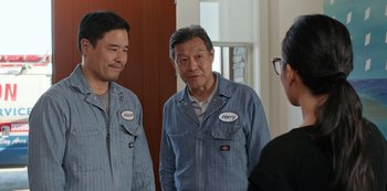 Movie still from “Always Be My Maybe” (2019), directed by Nahnatchka Khan – A group of men standing next to each other; Medium shot, Over the shoulder angle