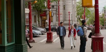 Movie still from “Always Be My Maybe” (2019), directed by Nahnatchka Khan – A man and a woman walking down a street; Wide shot, Over the shoulder angle