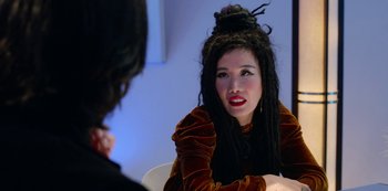 Movie still from “Always Be My Maybe” (2019), directed by Nahnatchka Khan – A woman with dreadlocks sitting in front of another person; Close Up shot, Over the shoulder angle