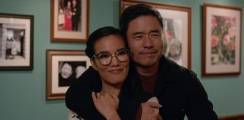 Movie still from “Always Be My Maybe” (2019), directed by Nahnatchka Khan – A man and a woman hugging in a room; Close Up shot, Over the shoulder angle