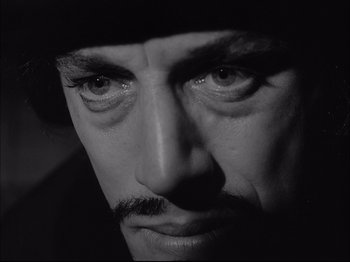 A man's face in a black and white photo