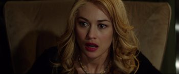 Movie still from “The Man Who Killed Don Quixote” (2018), directed by Terry Gilliam – A person with blonde hair; Close Up shot, Over the shoulder angle