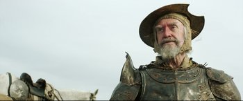 Movie still from “The Man Who Killed Don Quixote” (2018), directed by Terry Gilliam – An old man dressed as a medieval knight; Close Up shot, Low angle