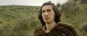 Movie still from “The Man Who Killed Don Quixote” (2018), directed by Terry Gilliam – A person with long brown hair; Close Up shot, Low angle