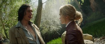 Movie still from “The Man Who Killed Don Quixote” (2018), directed by Terry Gilliam – A man and a woman talking in a field; Medium shot, Over the shoulder angle