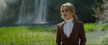 Movie still from “The Man Who Killed Don Quixote” (2018), directed by Terry Gilliam – A woman standing in front of a body of water; Medium shot, Low angle